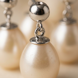 Orecchini con perle coltivate d'acqua dolce diametro 7-8 mm in oro bianco rosa