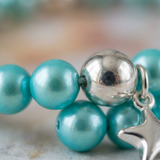 Bracciale portafortuna - Perla d'acqua dolce - Rotonda 5-6 mm Blu turchese