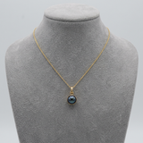 Pendente in oro giallo e perla coltivata Tahiti nera