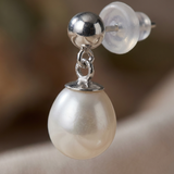 Orecchini in oro bianco e perle bianche | Abi