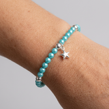 Bracciale portafortuna - Perla d'acqua dolce - Rotonda 5-6 mm Blu turchese