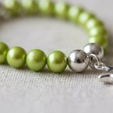 Bracciale Portafortuna - Perla d'acqua dolce - Rotonda 5-6 mm Verde tonico