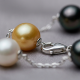 Bracciale in argento con perle coltivate di Tahiti e perla d'acqua dolce bianca/oro - Diametro 9-10 mm